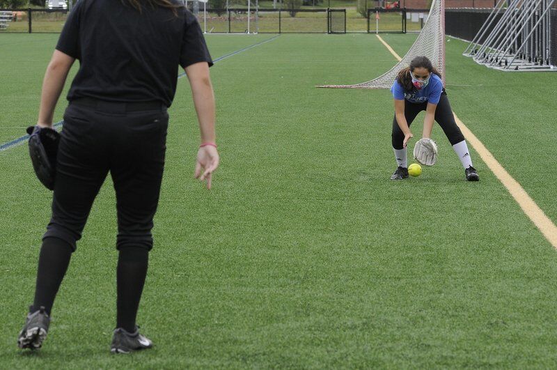 On the ball: Girls hone softball skills